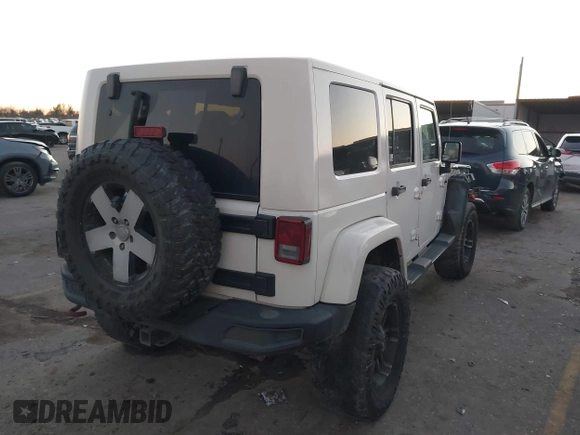 2010 Jeep Wrangler Unlimited Sahara with VIN 1J4BA5H15AL184376, listed as a IAAI auction lot 41270637 with 143,339 mi miles. Bid and sale history available at carsss.com. Image 4.