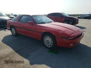 1988 Toyota Supra z VIN JT2MA71JXJ0094266, wystawiony jako Copart lot #59028715 z przebiegiem 133 654 mil mil oraz Czysty tytuł • Clean title. Historia ofert i sprzedaży dostępna na DreamBid. Obrazek 4.