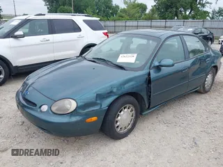 1996 Ford Taurus LX with VIN 1FALP53S3TG177324, listed as a IAAI auction lot 42622520 with 126,979 mi miles and . Bid and sale history available at DreamBid. Image 2.