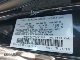 2015 Mazda 3 i SV with VIN JM1BM1T79F1245605, listed as a IAAI auction lot 41251417 with 121,264 mi miles. Bid and sale history available at carsss.com. Image 9.