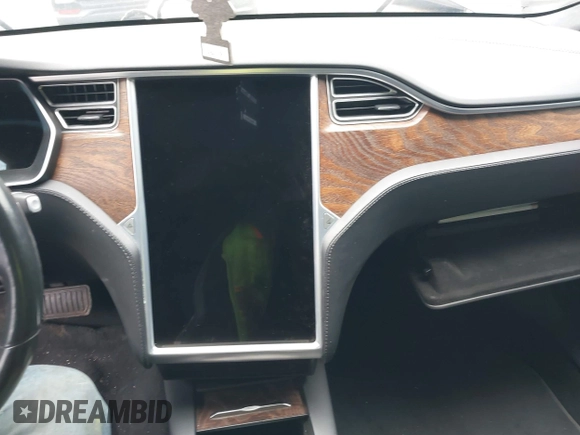2017 Tesla Model S 100D with VIN 5YJSA1E25HF215778, listed as a IAAI auction lot 41692605 with Not Provided miles and . Bid and sale history available at DreamBid. Image 18.