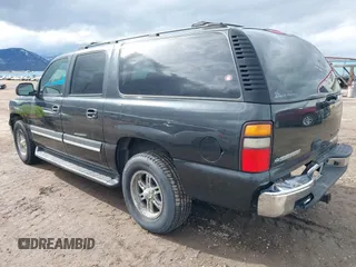 2004 Chevrolet Suburban LT with VIN 3GNEC16T84G317408, listed as a IAAI auction lot 41758444 with 296,784 mi miles. Bid and sale history available at carsss.com. Image 3.