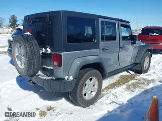 2013 Jeep Wrangler Unlimited Sport with VIN 1C4BJWDGXDL651995, listed as a IAAI auction lot 41578040 with 114,698 mi miles. Bid and sale history available at carsss.com. Image 4.