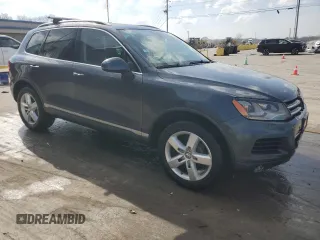 2011 Volkswagen Touareg Sport with VIN WVGFF9BPXBD005821, listed as a Copart auction lot 49391505 with 111,938 mi miles and Salvage Title. Bid and sale history available at DreamBid. Image 4.