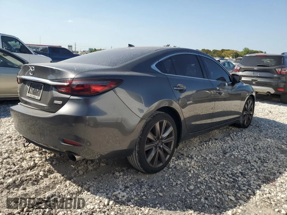 2018 Mazda 6 Grand Touring with VIN JM1GL1TY6J1303258, listed as a Copart auction lot 48738325 with 64,169 mi miles and Salvage Title. Bid and sale history available at DreamBid. Image 3.