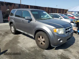 2011 Ford Escape XLS with VIN 1FMCU0C79BKC12943, listed as a Copart auction lot 64702085 with 151,117 mi miles and Clean title. Bid and sale history available at DreamBid. Image 4.