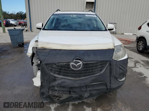 2015 Mazda CX-9 Touring with VIN JM3TB2CAXF0452576, listed as a Copart auction lot 88972245 with 148,152 mi miles and Salvage Title. Bid and sale history available at carsss.com. Image 5.