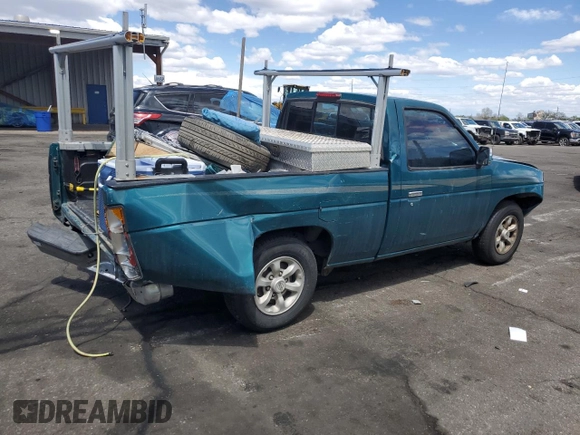 1997 Nissan Frontier XE with VIN 1N6SD11SXVC332100, listed as a Copart auction lot 54330245 with 203,959 mi miles and Salvage title. Bid and sale history available at DreamBid. Image 3.