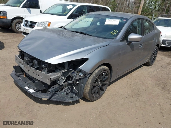 2016 Mazda Mazda3 i Sport with VIN JM1BM1T71G1335980, listed as a IAAI auction lot 42003186 with 131,015 mi miles. Bid and sale history available at carsss.com. Image 2.