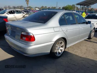 2003 BMW 5 Series 525iA with VIN WBADT43463G025654, listed as a IAAI auction lot 42152553 with 189,396 mi miles. Bid and sale history available at carsss.com. Image 4.