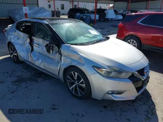 2016 Nissan Maxima SL with VIN 1N4AA6AP2GC414590, listed as a IAAI auction lot 41767047 with 125,056 mi miles and . Bid and sale history available at DreamBid. Image 1.