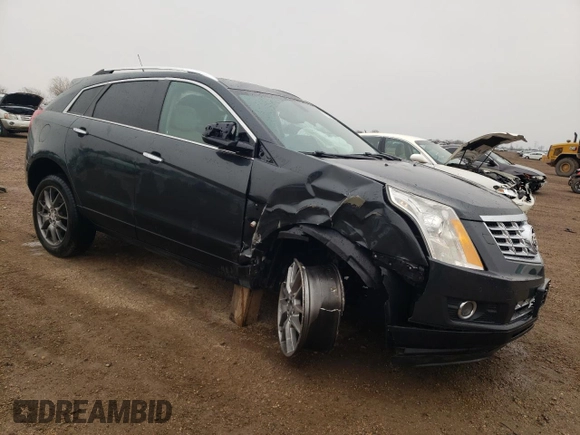 2014 Cadillac SRX Performance Collection z VIN 3GYFNCE36ES661204, wystawiony jako Copart lot #53478095 z przebiegiem 66 613 mil mil oraz Szkoda całkowita • Salvage title. Historia ofert i sprzedaży dostępna na DreamBid. Obrazek 4.