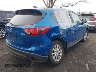 2013 Mazda CX-5 Touring with VIN JM3KE4CE0D0160711, listed as a IAAI auction lot 41843658 with 65,391 mi miles. Bid and sale history available at carsss.com. Image 6.