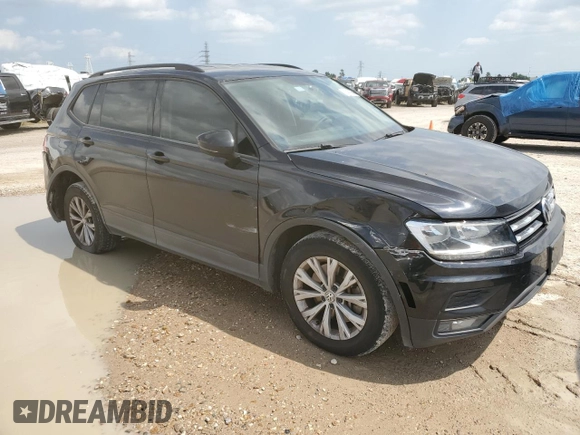 2018 Volkswagen Tiguan S with VIN 3VV1B7AX9JM020833, listed as a Copart auction lot 54539565 with 69,904 mi miles and Salvage title. Bid and sale history available at DreamBid. Image 4.