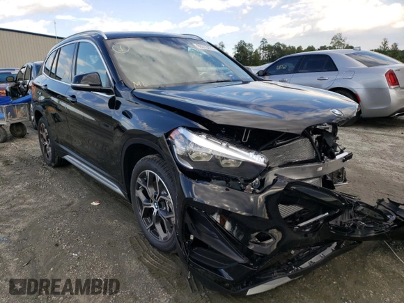 2022 BMW X1 xDrive28i with VIN WBXJG9C09N5V48303, listed as a Copart auction lot 60215072 with 1,643 mi miles. Bid and sale history available at carsss.com. Image 1.