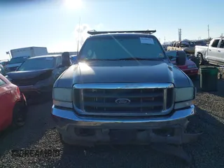 2003 Ford F-350 XL z VIN 1FTSW31P93ED31381, wystawiony jako IAAI lot #41388758 z przebiegiem 182 160 mil mil oraz . Historia ofert i sprzedaży dostępna na DreamBid. Obrazek 11.