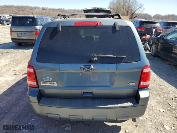2010 Ford Escape XLT with VIN 1FMCU0DG9AKC94640, listed as a Copart auction lot 49005645 with 101,293 mi miles and Salvage Title. Bid and sale history available at carsss.com. Image 6.