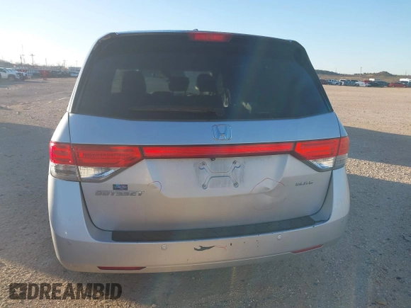 2014 Honda Odyssey Touring with VIN 5FNRL5H97EB094353, listed as a IAAI auction lot 41701712 with 141,228 mi miles and . Bid and sale history available at DreamBid. Image 17.