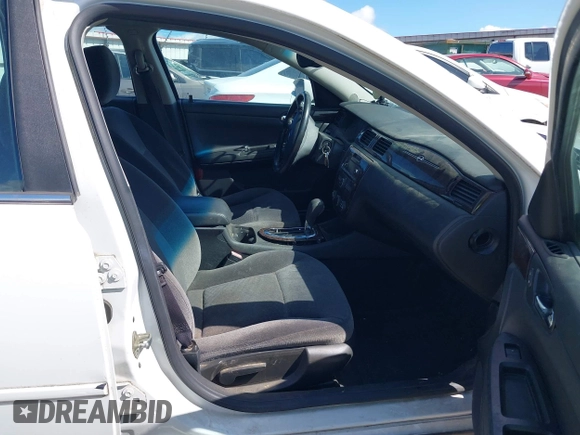 2014 Chevrolet Impala LS with VIN 2G1WA5E37E1189080, listed as a IAAI auction lot 42607058 with 128,337 mi miles and . Bid and sale history available at DreamBid. Image 5.