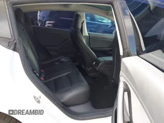 2020 Tesla Model 3 Long Range with VIN 5YJ3E1EB9LF795246, listed as a IAAI auction lot 41895750 with 163,061 mi miles and . Bid and sale history available at DreamBid. Image 8.