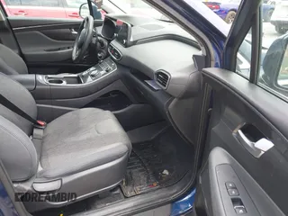 2021 Hyundai Santa Fe SE with VIN 5NMS14AJ2MH323542, listed as a IAAI auction lot 42182576 with 69,385 mi miles and . Bid and sale history available at DreamBid. Image 5.