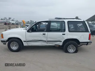 1992 Ford Explorer XL z VIN 1FMDU32X3NUD22144, wystawiony jako IAAI lot #42355356 z przebiegiem 107 047 mil mil oraz . Historia ofert i sprzedaży dostępna na DreamBid. Obrazek 13.