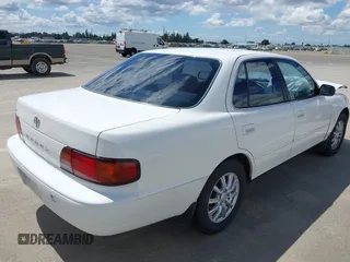 1996 Toyota Camry DX z VIN JT2BG12K8T0368612, wystawiony jako IAAI lot #42248750 z przebiegiem 122 237 mil mil oraz . Historia ofert i sprzedaży dostępna na DreamBid. Obrazek 4.