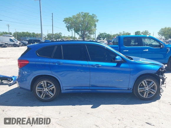 2017 BMW X1 sDrive28i with VIN WBXHU7C31H5H33281, listed as a IAAI auction lot 41814792 with 55,756 mi miles. Bid and sale history available at carsss.com. Image 14.