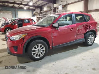 2016 Mazda CX-5 Sport z VIN JM3KE4BY9G0824021, wystawiony jako Copart lot #52392345 z przebiegiem 121 990 mil mil oraz Szkoda całkowita • Salvage title. Historia ofert i sprzedaży dostępna na DreamBid. Obrazek 1.