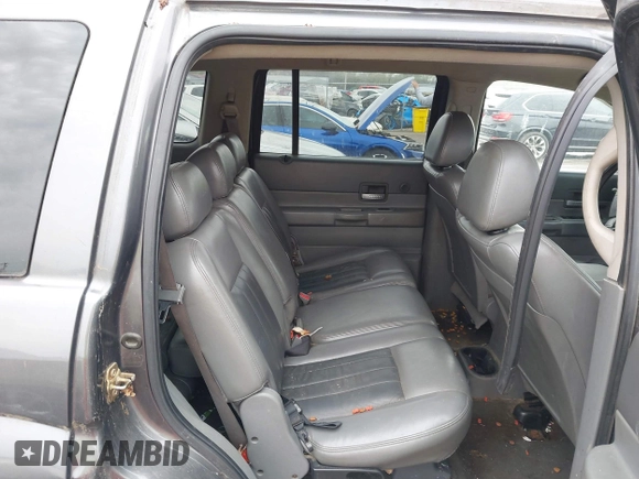 2004 Dodge Durango Limited with VIN 1D4HB58N24F202791, listed as a IAAI auction lot 41807475 with 99,913 mi miles and . Bid and sale history available at DreamBid. Image 8.