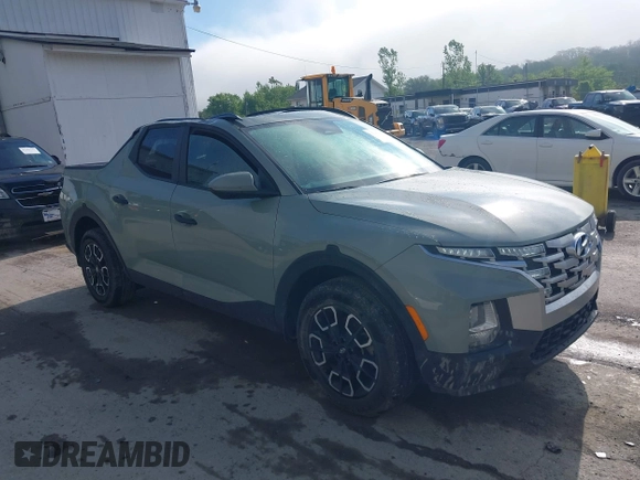 2022 Hyundai Santa Cruz SEL z VIN 5NTJCDAE8NH024149, wystawiony jako IAAI lot #42197663 z przebiegiem 51 491 mil mil oraz . Historia ofert i sprzedaży dostępna na DreamBid. Obrazek 1.