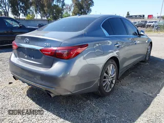 2019 Infiniti Q50 3.0t LUXE with VIN JN1EV7AP5KM519569, listed as a IAAI auction lot 42078137 with 134,486 mi miles. Bid and sale history available at carsss.com. Image 4.
