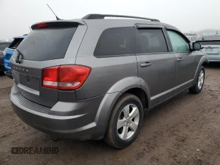 2013 Dodge Journey American Value with VIN 3C4PDCABXDT578099, listed as a Copart auction lot 48867795 with 187,338 mi miles and Salvage title. Bid and sale history available at DreamBid. Image 3.