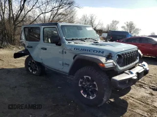 2024 Jeep Wrangler Rubicon with VIN 1C4RJXR61RW255979, listed as a Copart auction lot 43451095 with 7,258 mi miles and Salvage title. Bid and sale history available at DreamBid. Image 4.