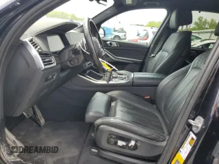 2023 BMW X5 xDrive45e z VIN 5UXTA6C01P9R61137, wystawiony jako Copart lot #56458155 z przebiegiem 27 501 mil mil oraz Szkoda całkowita • Salvage title. Historia ofert i sprzedaży dostępna na DreamBid. Obrazek 7.