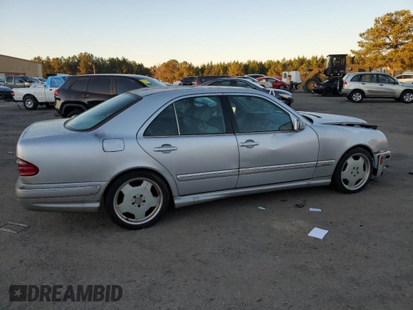 2000 Mercedes-Benz E-Class with VIN WDBJF70JXYB113988, listed as a Copart auction lot 86325514 with 198,321 mi miles and Salvage Title. Bid and sale history available at carsss.com. Image 3.