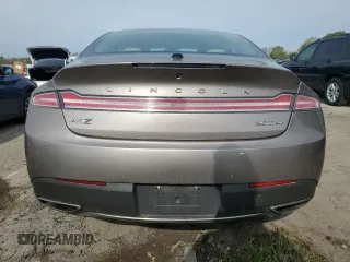 2018 Lincoln MKZ Select z VIN 3LN6L5D90JR628225, wystawiony jako Copart lot #54855245 z przebiegiem 56 292 mil mil oraz Szkody całkowita. Historia ofert i sprzedaży dostępna na DreamBid. Obrazek 6.