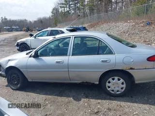 2002 Ford Escort Fleet Standard z VIN 3FAFP13P12R209941, wystawiony jako IAAI lot #41790208 z przebiegiem 112 422 mil mil oraz . Historia ofert i sprzedaży dostępna na DreamBid. Obrazek 14.