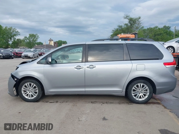 2014 Toyota Sienna XLE z VIN 5TDYK3DC6ES488569, wystawiony jako IAAI lot #42171540 z przebiegiem 97 416 mil mil oraz . Historia ofert i sprzedaży dostępna na DreamBid. Obrazek 15.