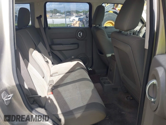 2007 Dodge Nitro SXT z VIN 1D8GT28K17W530705, wystawiony jako IAAI lot #42456213 z przebiegiem 217 175 mil mil oraz . Historia ofert i sprzedaży dostępna na DreamBid. Obrazek 8.