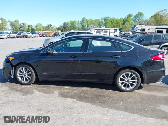 2019 Ford Fusion SEL with VIN 3FA6P0MU6KR252797, listed as a IAAI auction lot 41994504 with 106,029 mi miles and . Bid and sale history available at DreamBid. Image 14.