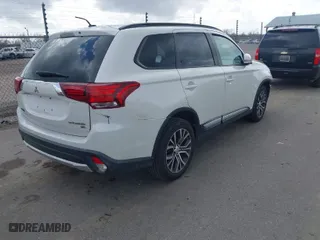 2016 Mitsubishi Outlander SE with VIN JA4AD3A33GZ033884, listed as a IAAI auction lot 41571675 with 142,405 mi miles. Bid and sale history available at carsss.com. Image 4.