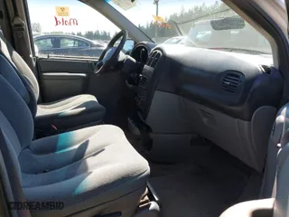 2005 Dodge Caravan SE with VIN 1D4GP25R55B298363, listed as a IAAI auction lot 42068006 with 306,997 mi miles. Bid and sale history available at carsss.com. Image 5.