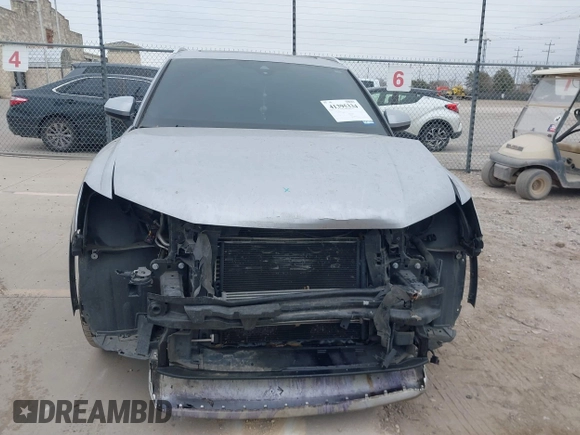 2021 Audi Q3 Premium with VIN WA1AUCF35M1066713, listed as a IAAI auction lot 41395334 with 82,724 mi miles and . Bid and sale history available at DreamBid. Image 13.