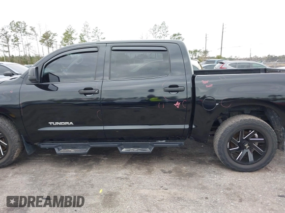 2012 Toyota Tundra 4WD Truck with VIN 5TFDW5F14CX268378, listed as a IAAI auction lot 41412922 with 148,763 mi miles. Bid and sale history available at carsss.com. Image 14.