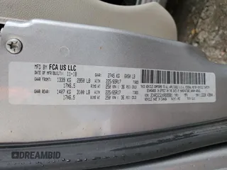 2019 Dodge Grand Caravan SXT with VIN 2C4RDGCG1KR595981, listed as a Copart auction lot 88133645 with 104,852 mi miles and Salvage Title. Bid and sale history available at DreamBid. Image 13.