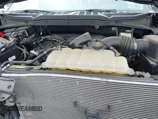 2022 Ford F-150 XL with VIN 1FTFW1E5XNKD93407, listed as a IAAI auction lot 42381355 with 26,816 mi miles and . Bid and sale history available at DreamBid. Image 10.