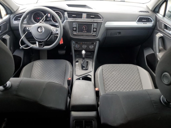 2018 Volkswagen Tiguan S с VIN 3VV1B7AX5JM062805, выставлен на аукционе Copart как лот 57927875 с пробегом 88 774 миль миль и Списание • Salvage title. История ставок и продаж доступна на DreamBid. Изображение 8.