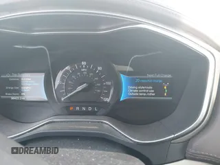 2017 Ford Fusion Titanium z VIN 3FA6P0SU5HR373140, wystawiony jako IAAI lot #41082406 z przebiegiem 98 422 mil mil oraz . Historia ofert i sprzedaży dostępna na DreamBid. Obrazek 7.