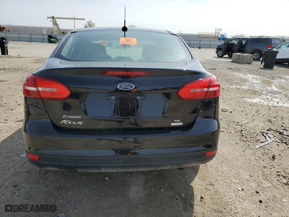 2018 Ford Focus SE with VIN 1FADP3FEXJL287127, listed as a Copart auction lot 51211045 with 62,867 mi miles and Clean Title. Bid and sale history available at carsss.com. Image 6.